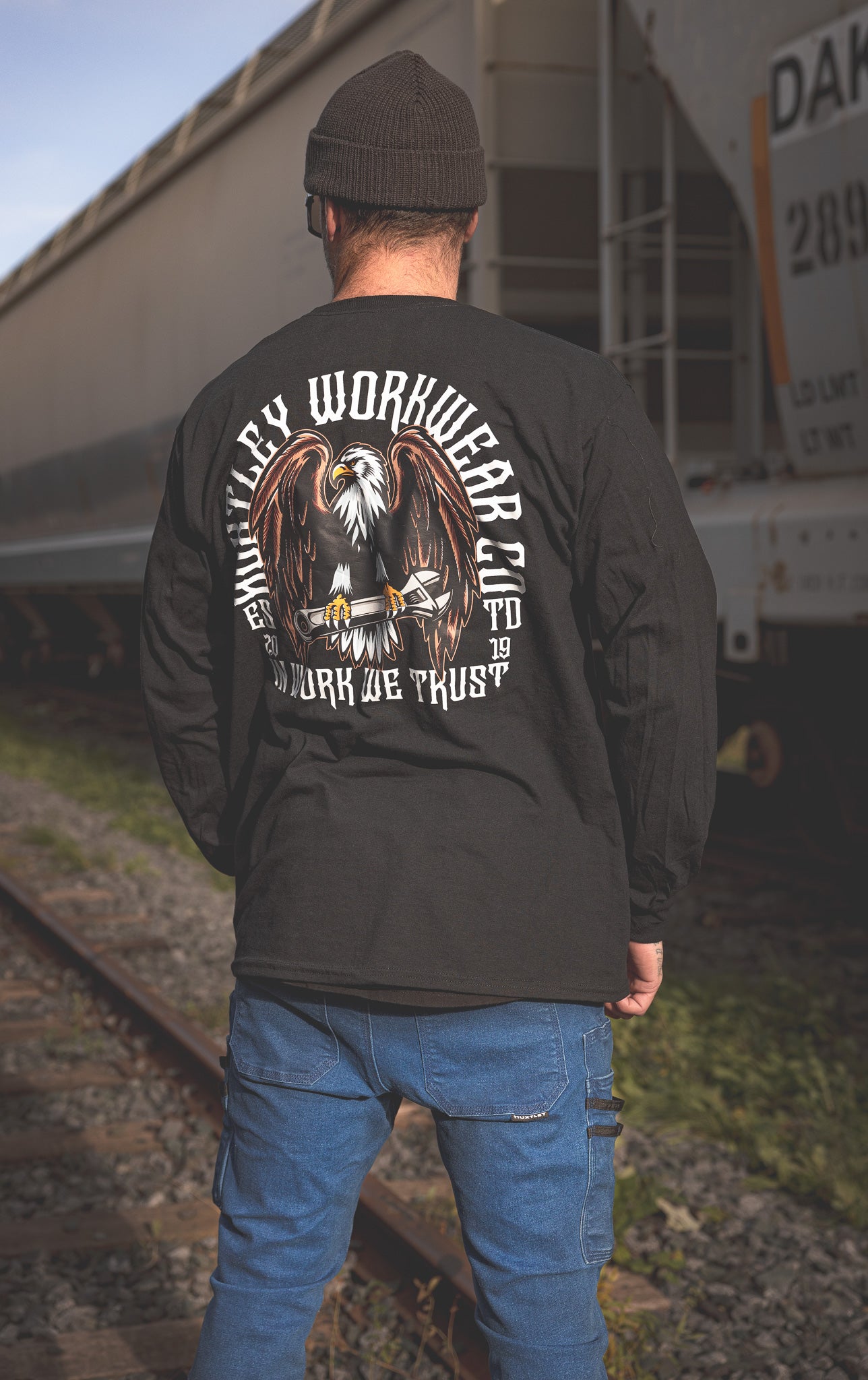 
                  
                    HX-226 "In Work We Trust" L/S Tee
                  
                