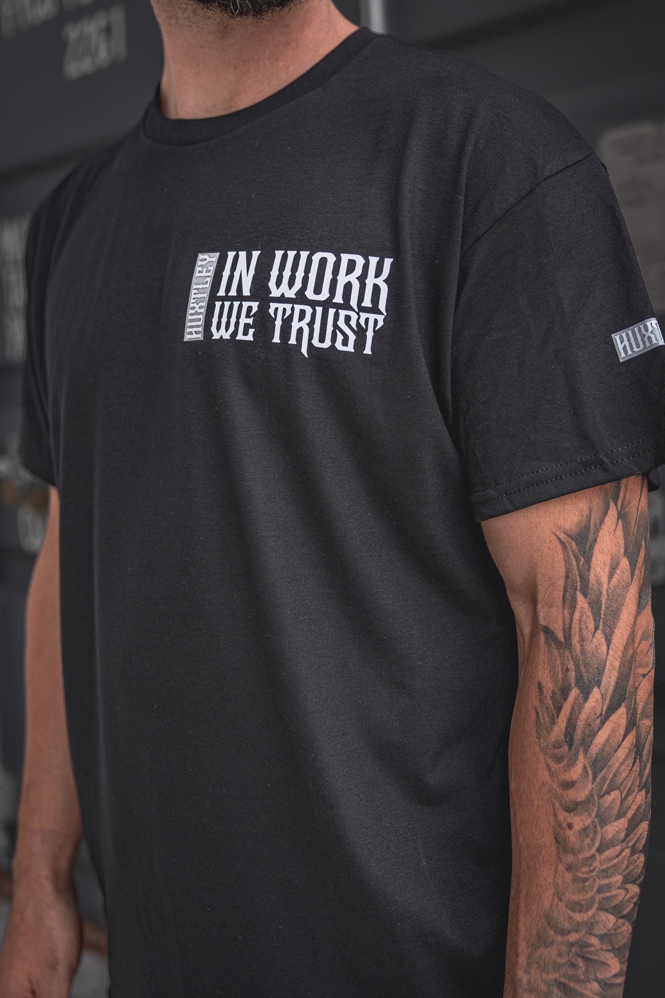 
                  
                    HX-891 "In Work We Trust" Tee
                  
                