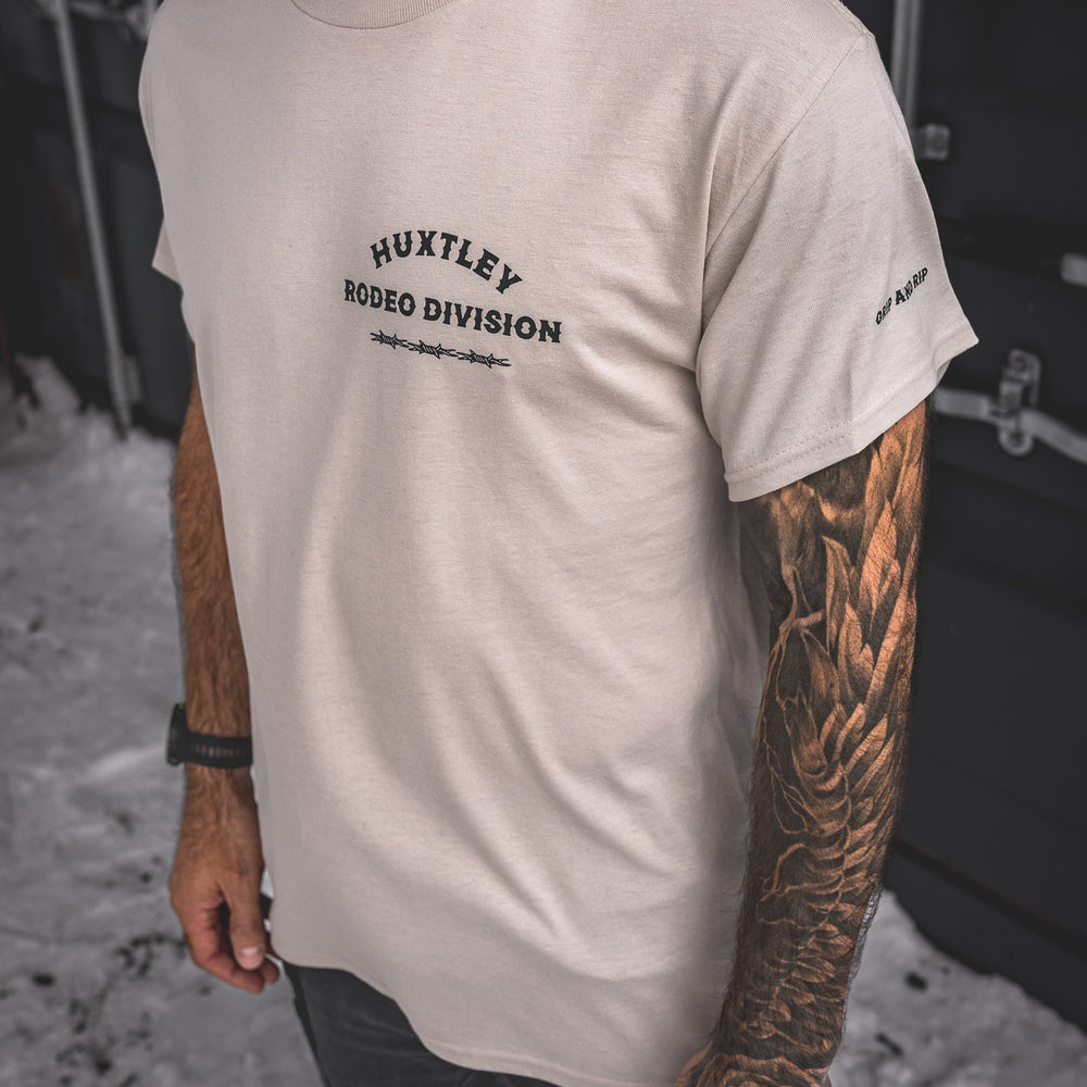 
                  
                    HX-891 "Rodeo Division" Tee Sand/ Black
                  
                