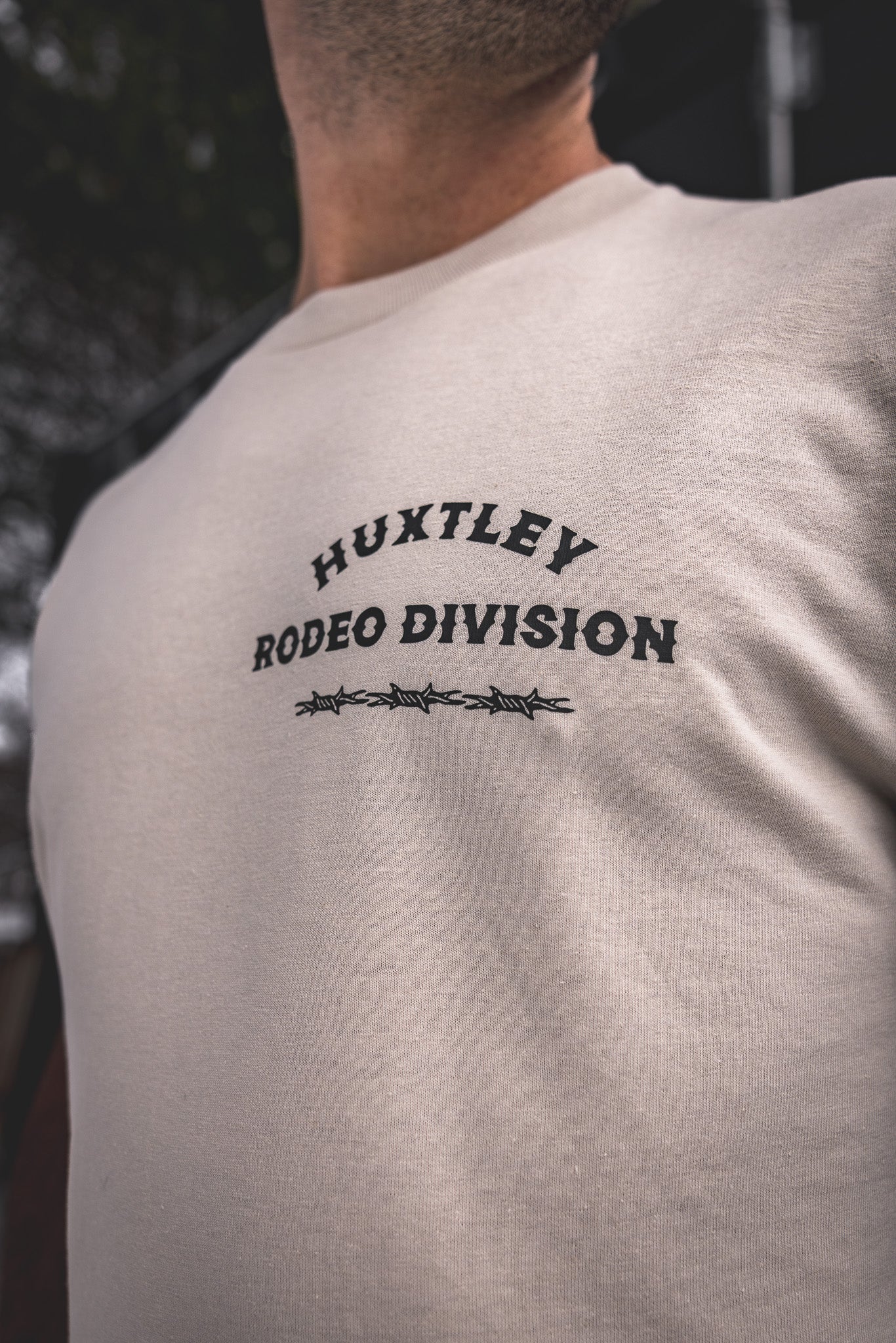 
                  
                    HX-891 "Rodeo Division" Tee Sand/ Black
                  
                