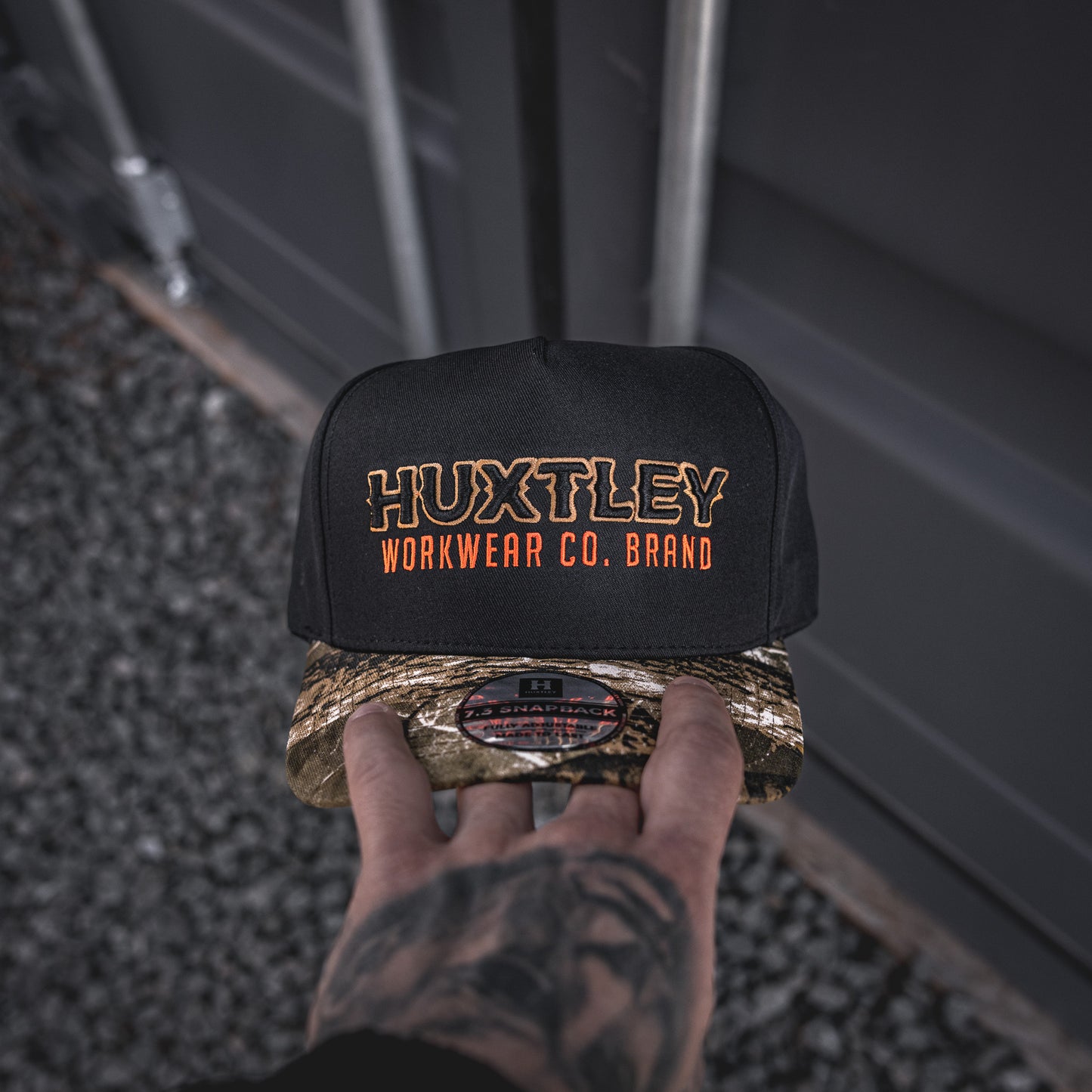 
                  
                    HS-73 "Workwear Co. Brand" Snapback Black/ Hunter Camo/ Sawdust
                  
                