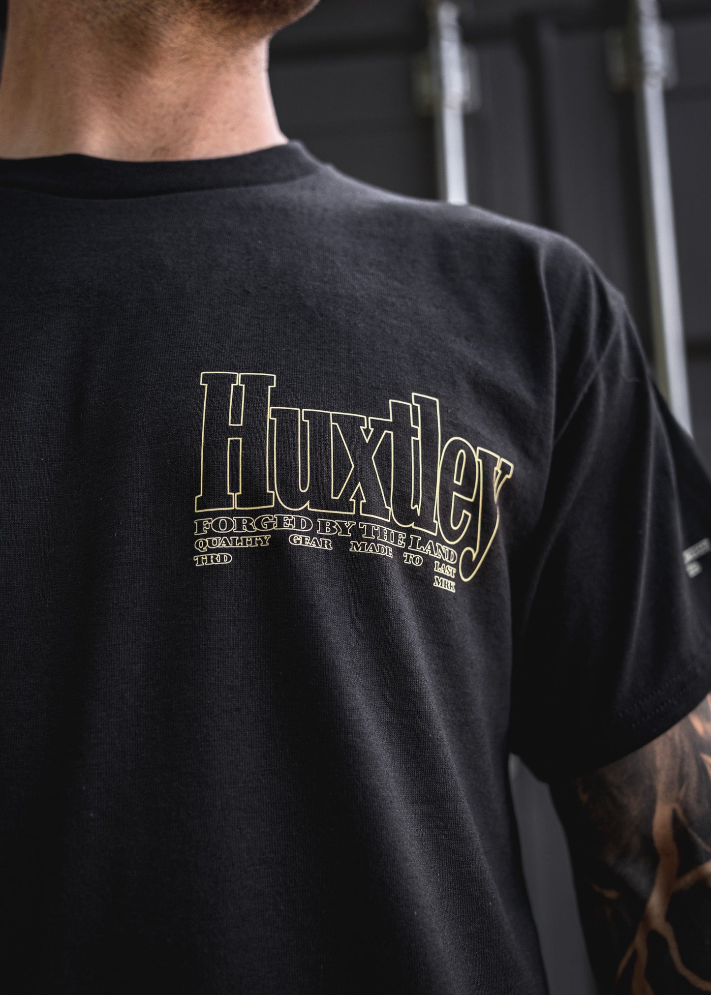 
                  
                    HX-891 "Forged By The Land" Tee
                  
                