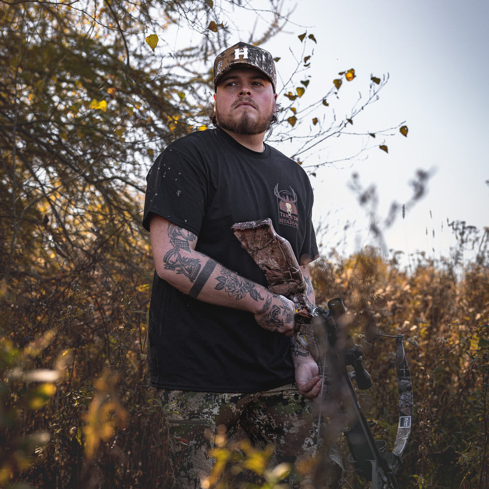 
                  
                    HX-891 "Track'em or starve" Tee
                  
                