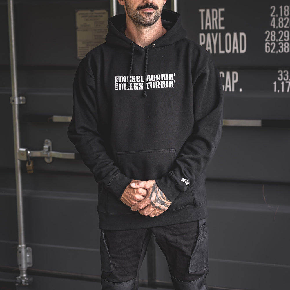 
                  
                    Full-body look featuring the “Diesel Burnin’ Miles Turnin’” hoodie paired with rugged Huxtley cargo Pro Pants and the Huxtley Throwback snapback. Built for grit, comfort, and long hauls.
                  
                