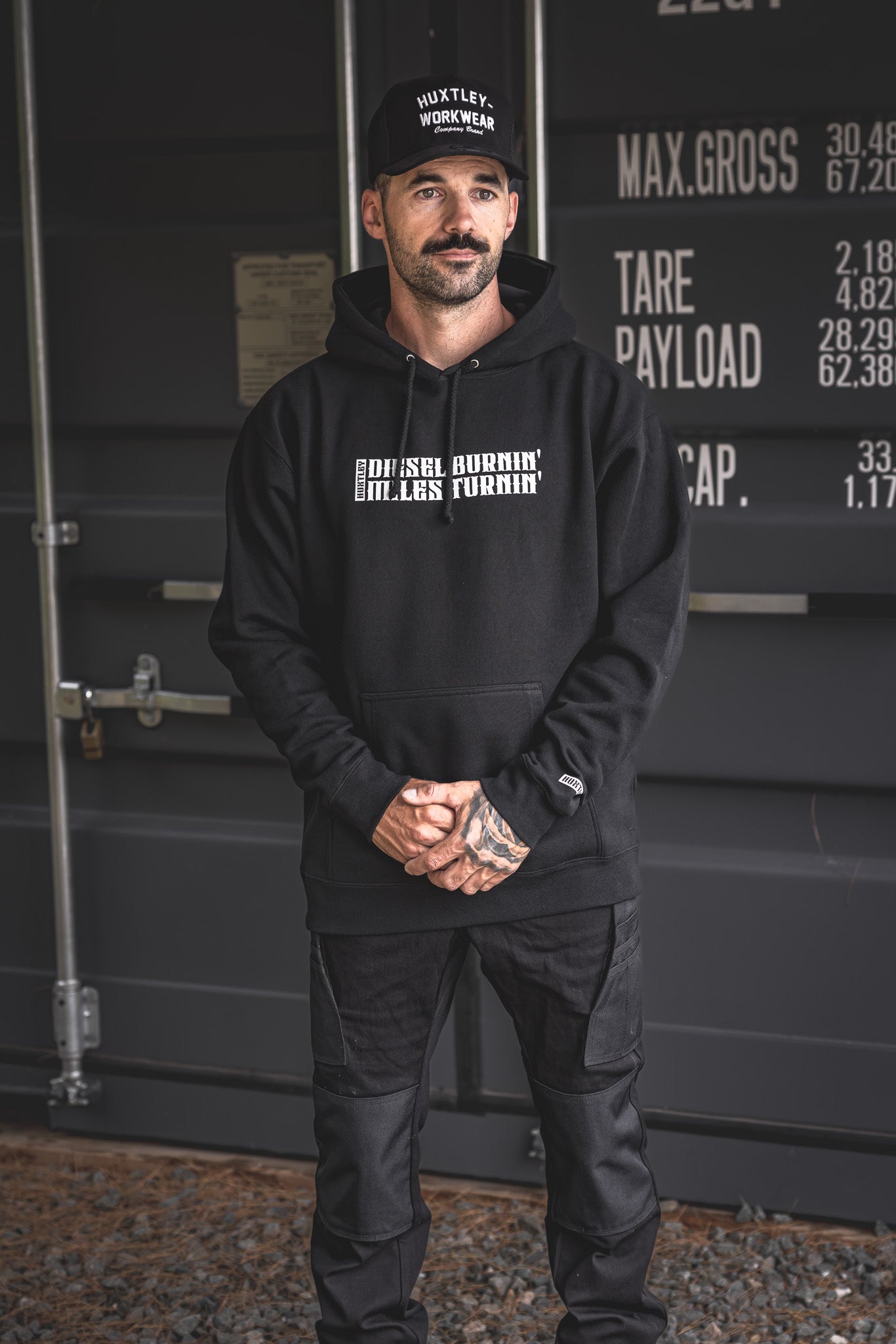 
                  
                    Full-body look featuring the “Diesel Burnin’ Miles Turnin’” hoodie paired with rugged Huxtley cargo Pro Pants and the Huxtley Throwback snapback. Built for grit, comfort, and long hauls.
                  
                