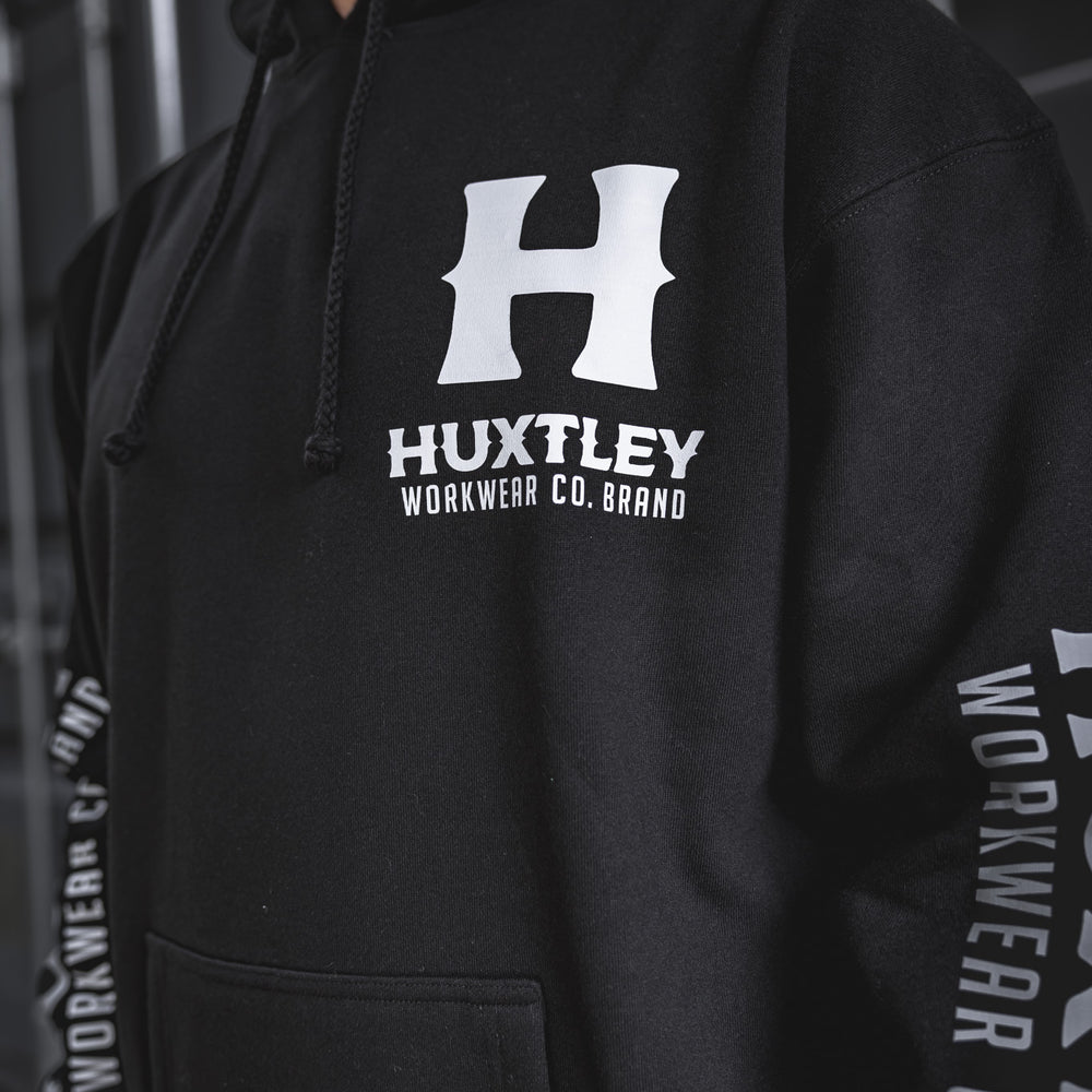
                  
                    A closer look at the hardwearing Full Print Hoodie featuring the Huxtley white logo front and sleeve hits. Crew-tested, shop-tough, and built for everyday grind.
                  
                