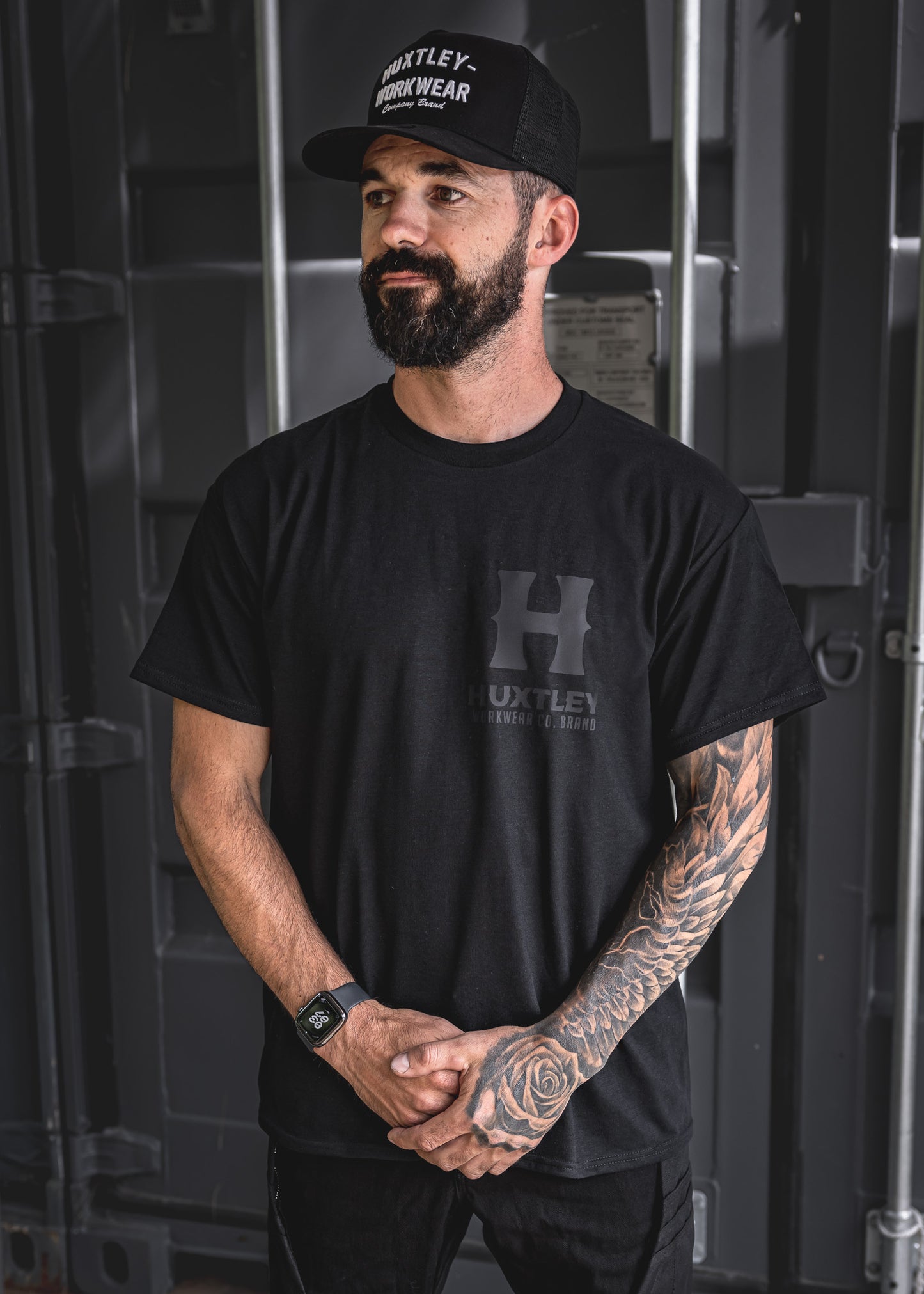 
                  
                    Front view of the Huxtley Full Print T-shirt with blackout logo. Clean, stealthy, and made to last — perfect for the jobsite or weekend runaround.
                  
                