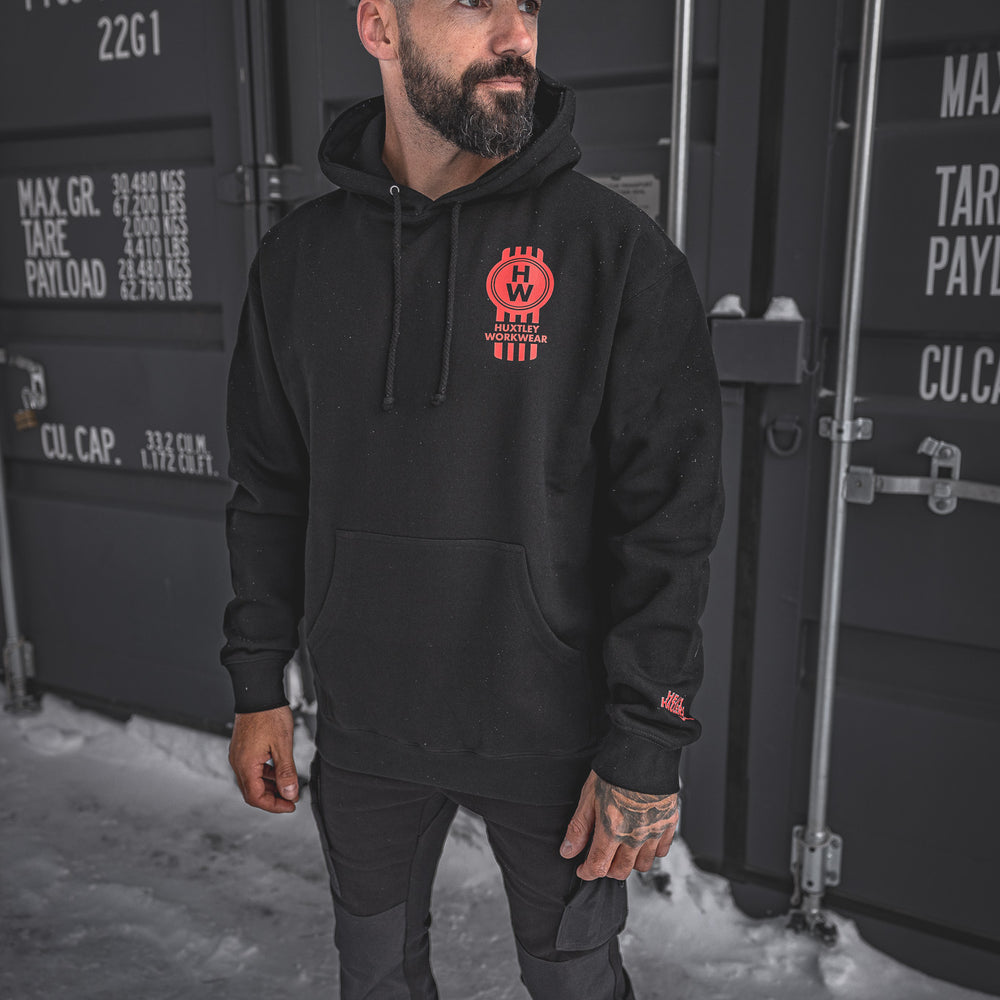 
                  
                    The Huxtley Heavy Haulers Club Hoodie brings the heat with a bold red "HW" chest print and sleeve detail. Built for cold mornings on the jobsite or long hauls on the road, this hoodie delivers hardcore comfort and grit.
                  
                