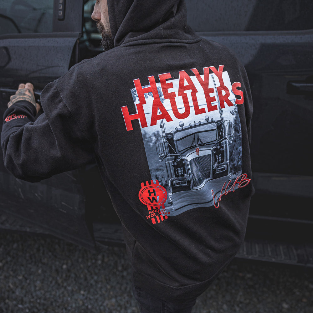 
                  
                    Rep the road in the Huxtley Heavy Haulers Club Hoodie. Featuring a bold red print and back graphic of a classic Kenworth rig, this hoodie is made for truckers, wrench-turners, and heavy haulers who don't stop for nothin'.
                  
                