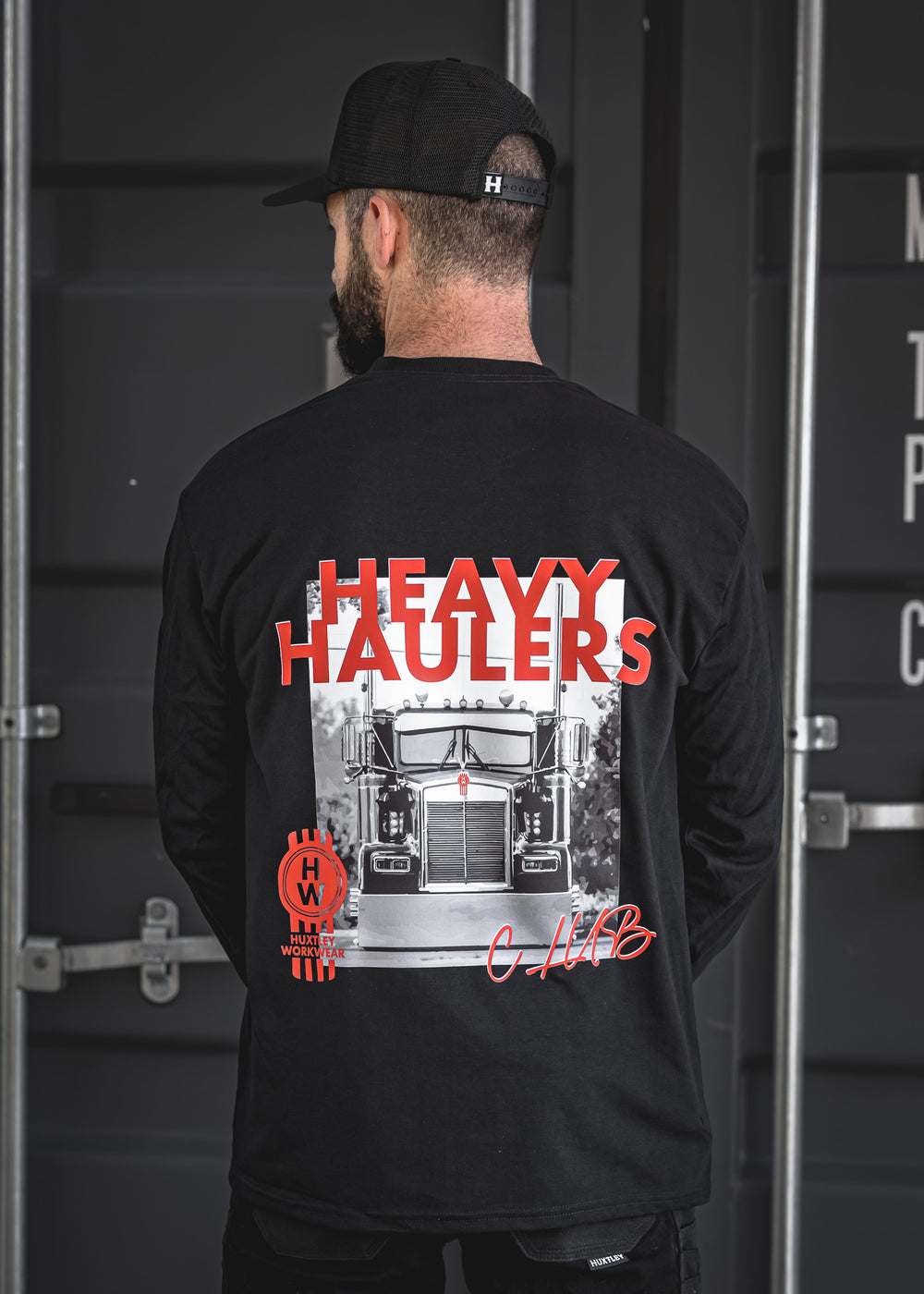 Bold back hit on this long sleeve tee featuring a classic Kenworth front view, red “HEAVY HAULERS” lettering, Huxtley Workwear emblem, and CLUB signature. Built for the road crew.