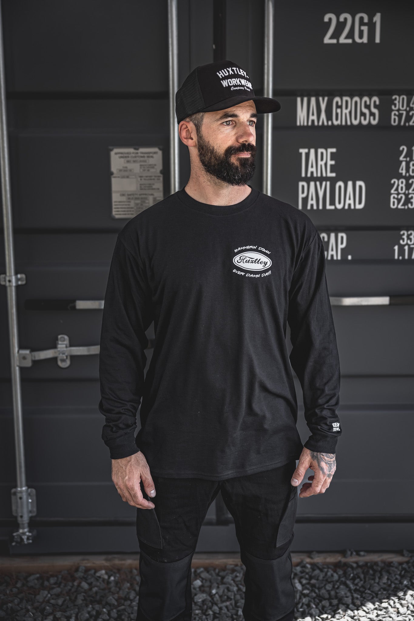 
                  
                    Full front shot of the black long sleeve featuring the oval “Huxtley” logo and “Hammerin’ Down Every Damn Day!!” chest hit. Sleeve detail reads “Keep On Trucking” for that classic big rig vibe.
                  
                
