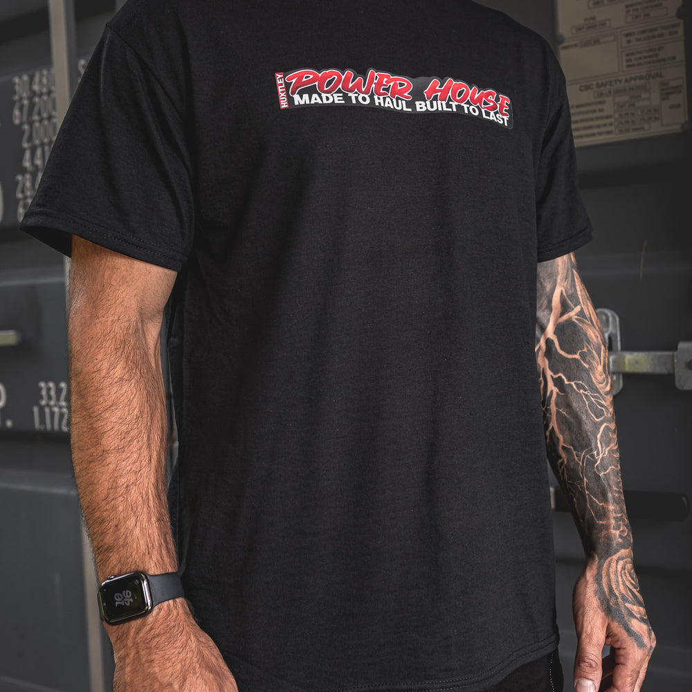 
                  
                    Work-ready black tee with bold “POWER HOUSE – Made to Haul, Built to Last” print. Heavyweight cotton, clean fit, and tough enough for the site or the street.
                  
                