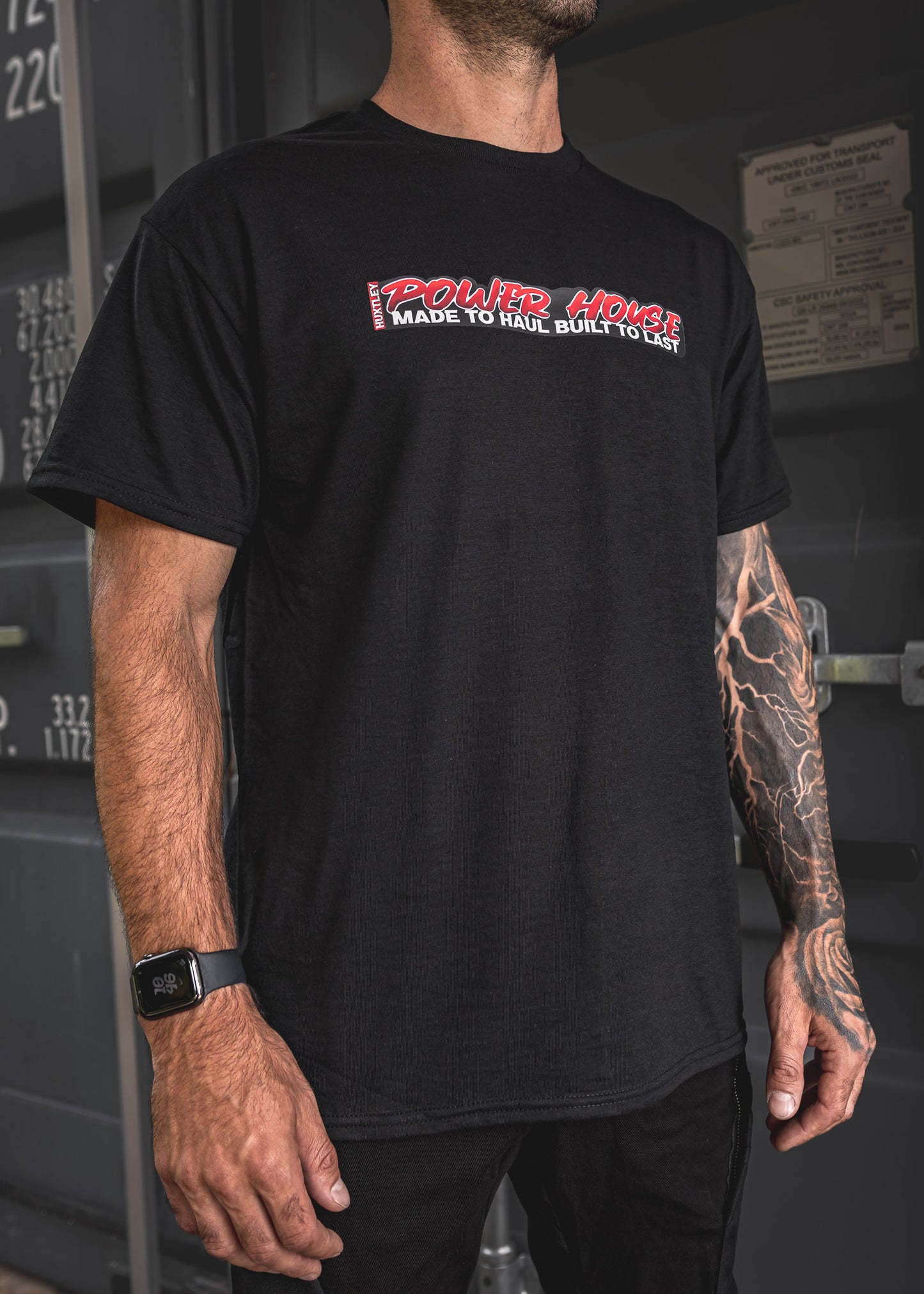 
                  
                    Work-ready black tee with bold “POWER HOUSE – Made to Haul, Built to Last” print. Heavyweight cotton, clean fit, and tough enough for the site or the street.
                  
                