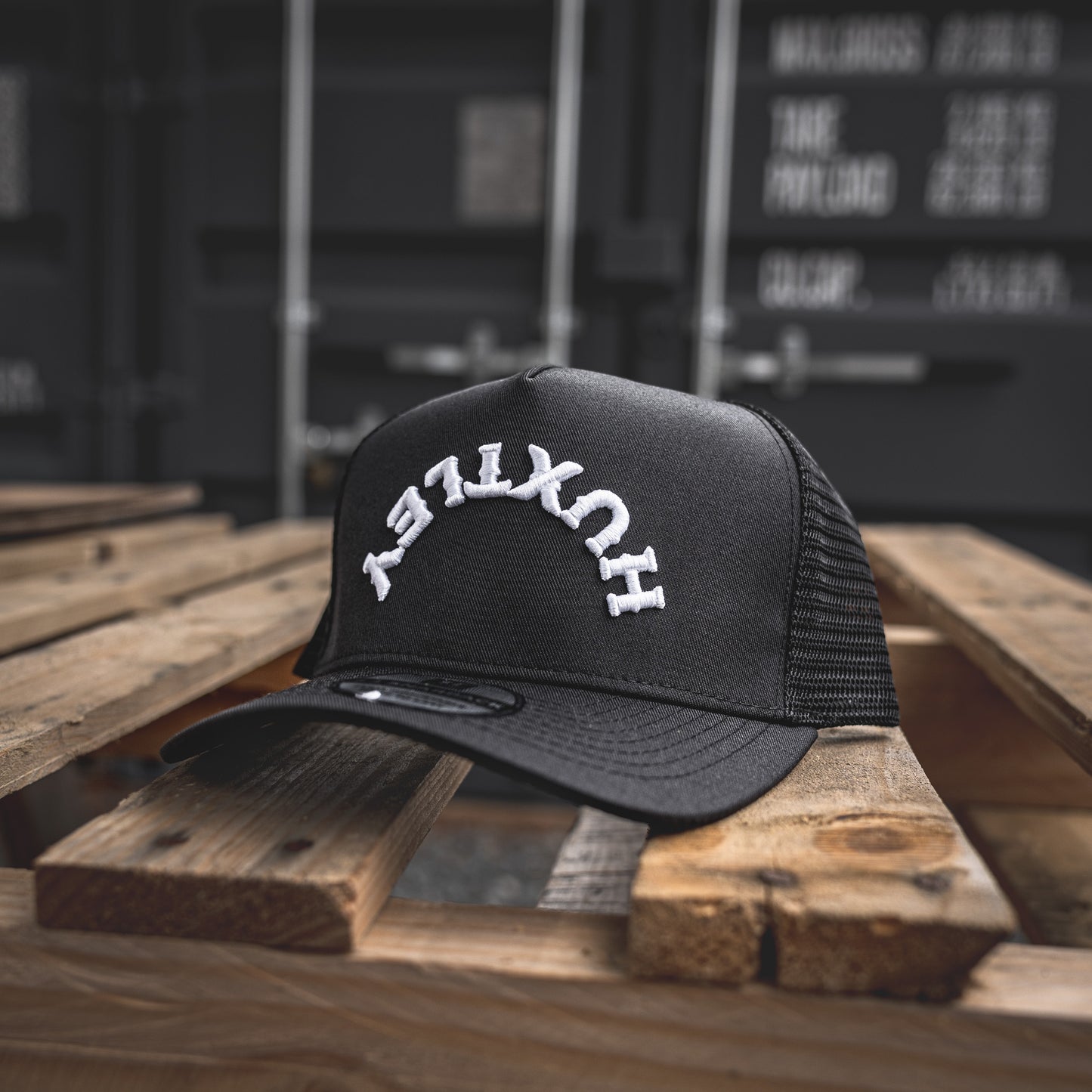 Flip the script with the Huxtley Reverse Logo trucker cap. A bold statement piece with white raised embroidery on a structured black mesh build. Clean. Rugged. Unmissable.