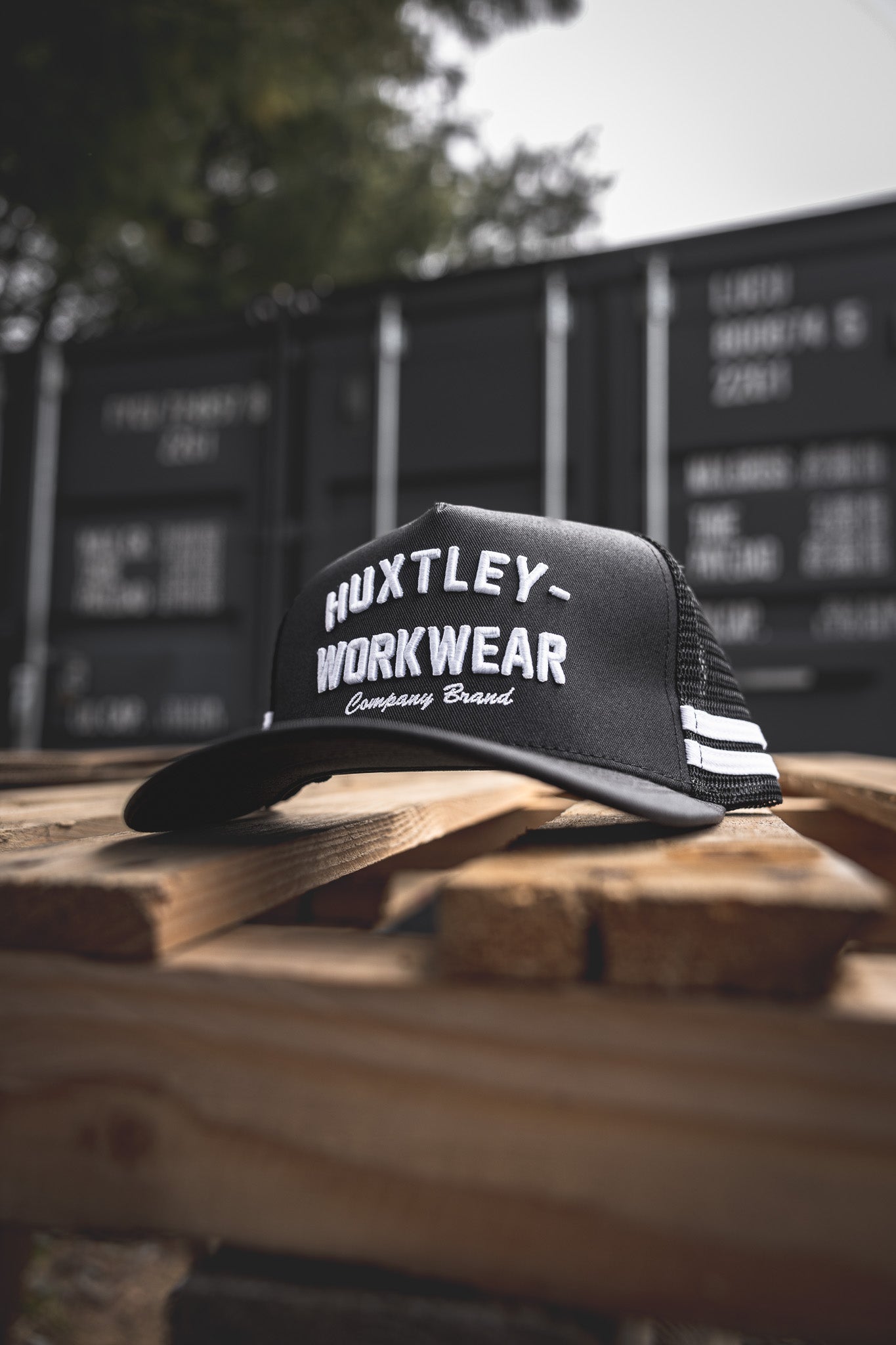 
                  
                    The Throwback cap from Huxtley brings a modern edge to old-school workwear. Featuring bold arched embroidery and heritage-style striping, it’s built for the jobsite and beyond.
                  
                