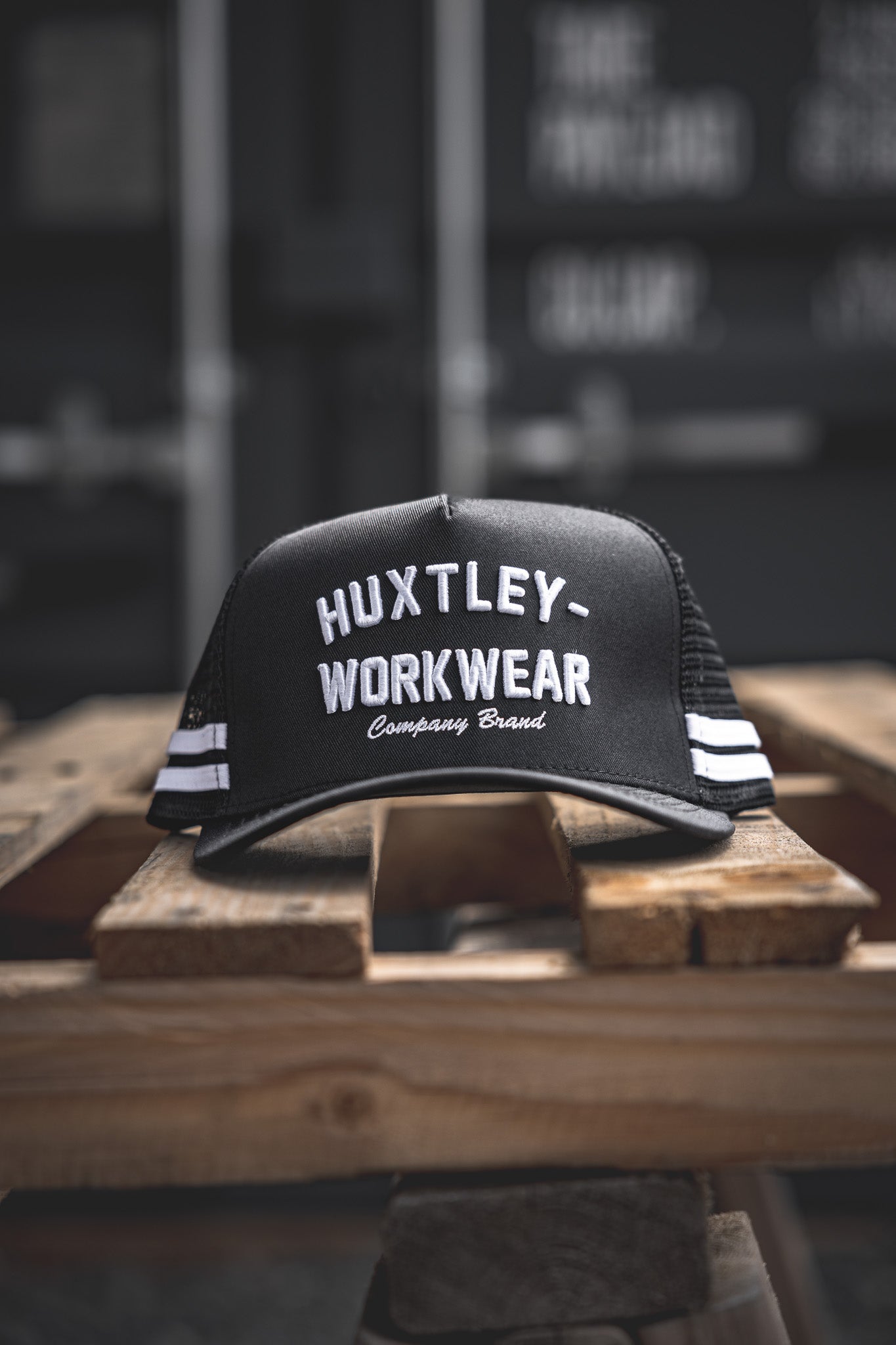 
                  
                    Level up your fit with the Throwback cap from Huxtley Workwear. Featuring bold arch text, contrast double stripes, and vintage shop-floor vibes. A classic built for modern grit.
                  
                